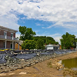 Buildings surrounded by sandbags