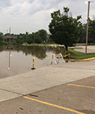 small picture of flooding in State employee parking lot